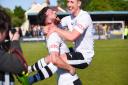 Rory McAuley and Aaron Jones, right, celebrate a monumental day for King's Lynn Town at Warrington last May Picture: Ian Burt