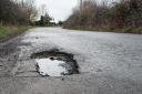 It is not advised to begin filling in potholes yourself