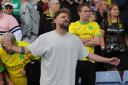 A frustrated City fan shows his disappointment after the defeat at Oxford