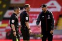 David Coote and Jurgen Klopp clash