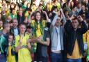 The travelling Norwich fans celebrate victory at the City Ground, Nottingham Picture: Paul Chesterton/Focus Images Ltd