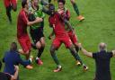 Portugal players celebrate after Eder (centre) scores his side's goal in the final against France. PIC: Joe Giddens/PA Wire.