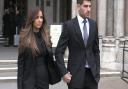 Ched Evans leaving the Court of Appeal in London with partner Natasha Massey. Photo: PA Video/PA Wire