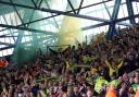 A flare is let off during the first leg of the Championship play-off semi-final at Ipswich Towns Portman Road ground.