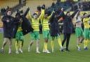 Norwich City players salute the home fans after beating West Brom 2-0 in the Championship