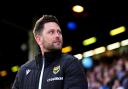 Oxford United boss Des Buckingham is relishing the chance to pit his wits against Norwich City.