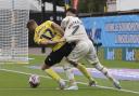 Borja Sainz tussles for the ball in Norwich City's 2-0 Championship defeat at Oxford