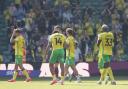 Norwich players applaud the fans at the end of the win over Watford