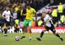 Marcelino Nunez and Ben Osborn compete for the ball