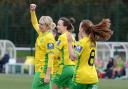 Natasha Snelling punches the air after completing her hat-trick