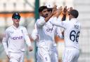 Shoaib Bashir, centre, gave England hope (Anjum Naveed/AP)