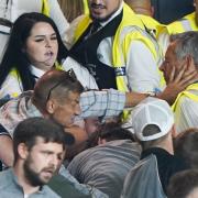 Tempers flare in the stands as police and stewards intervene during the Sky Bet Championship match at Carrow Road, Norwich. Picture date: Friday August 19, 2022.