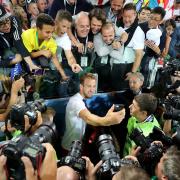 The main man - England's Harry Kane takes a selfie with fans, and a few photographers Picture:PA