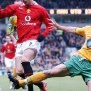 Two worlds collide - Adam Drury tackles Cristiano Ronaldo during a Premier League game at Carrow Road in April, 2005 Picture: PA