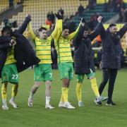 Norwich City players salute the home fans after beating West Brom 2-0 in the Championship