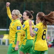 Natasha Snelling punches the air after completing her hat-trick