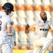 Harry Brook, left, reacts after being bowled by Sajid Khan (KM Chadary/AP)