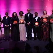 The Prince of Wales poses with the award winners, including Shannon (far right), during the Centrepoint Awards (Hollie Adams/PA)