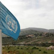 A Unifil flag fluttering over southern Lebanon (Alamy/PA)