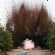 Photo provided by the North Korean government showing the demolition of parts of the northern sections of unused road and rail links that once connected the country with the South (Korean Central News Agency/Korea News Service/AP)