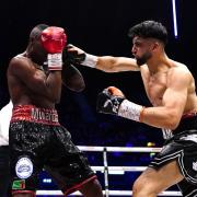 Adam Azim, right, hopes to inspire British Asians inside and outside the ring (Zac Goodwin/PA)