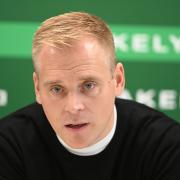 Norwich City head coach Johannes Hoff Thorup addresses the media