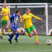 Holly Kennard drives into the Actonians' box