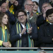 New Norwich City chief Mark Attanasio (centre) impressed supporters at the club's AGM